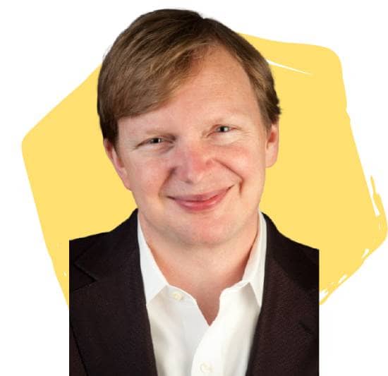 Jim Messina, Board Director, in front of a yellow hexagon.